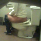 A camera hidden under a public restroom sink records an unsuspecting woman taking a noisy, wet, gurgling-sounding shit while sitting on a toilet. No poop is shown, but great sounds are heard! About 2 minutes.
